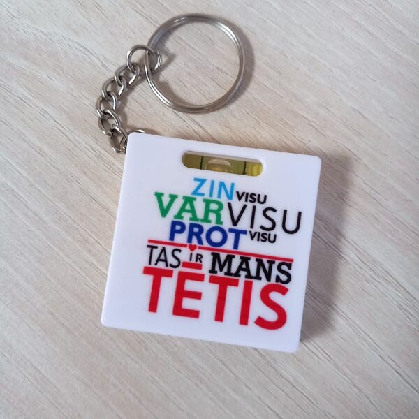 Atslēgu piekariņš/mērlena ar līmeņrādi