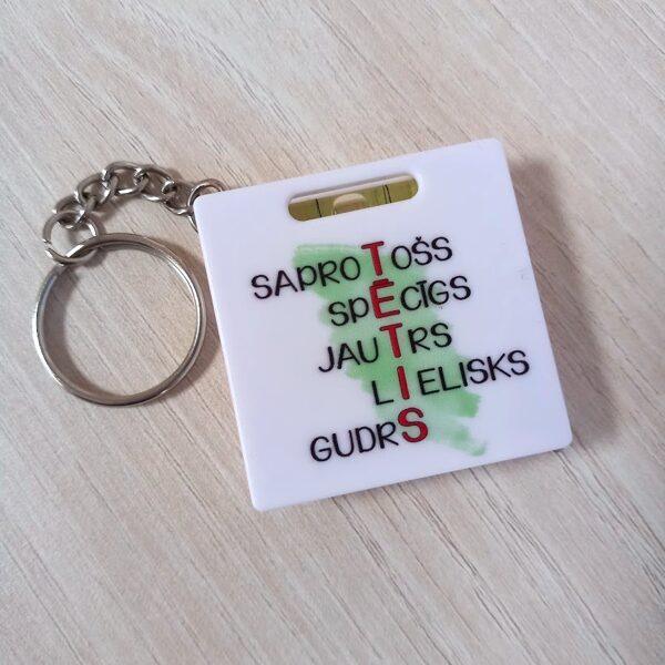 Atslēgu piekariņš/mērlena ar līmeņrādi